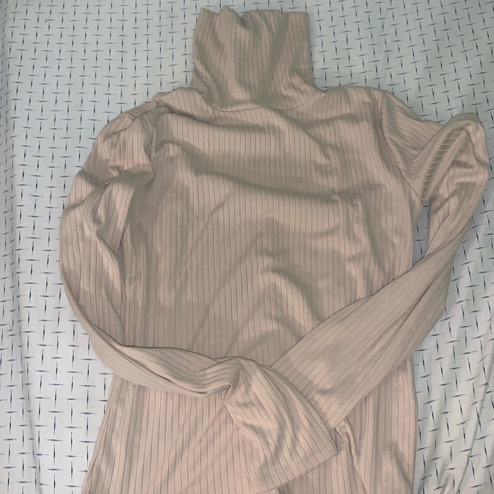 Nude color turtleneck shirt